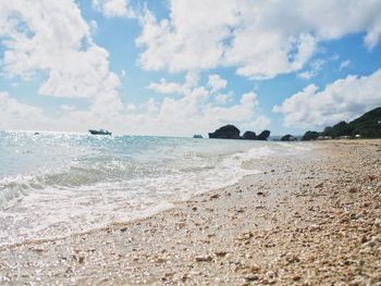 Scenic view of beach against sky