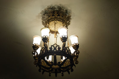 Low angle view of illuminated chandelier