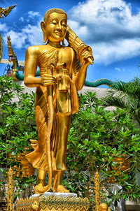 Low angle view of statue against sky