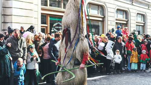 People standing on street in city