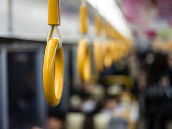 Close-up of yellow hanging outdoors