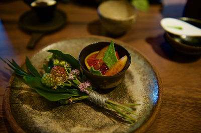 Close-up of fruits in bowl on table