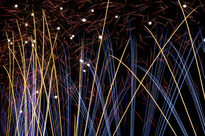 Full frame shot of firework display at night