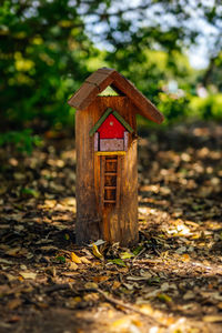 Close-up of birdhouse on tree