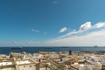 Scenic view of sea against blue sky