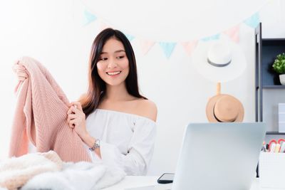 Young woman using smart phone