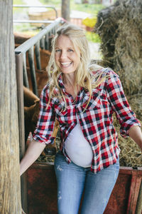Pregnant woman on farm