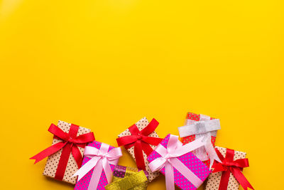 Close-up of umbrella on yellow paper