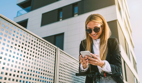 Young woman using mobile phone