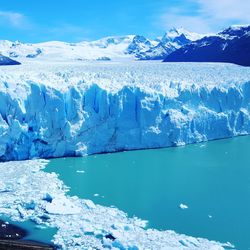 Scenic view of frozen sea against sky