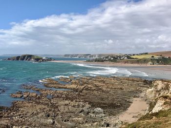 Scenic view of beach against sky
