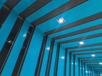 Low angle view of illuminated modern building
