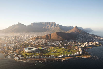 High angle shot of town against mountains