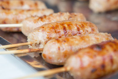 Close-up of meat on barbecue grill