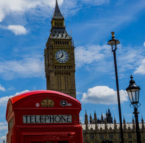 Low angle view of clock tower against sky