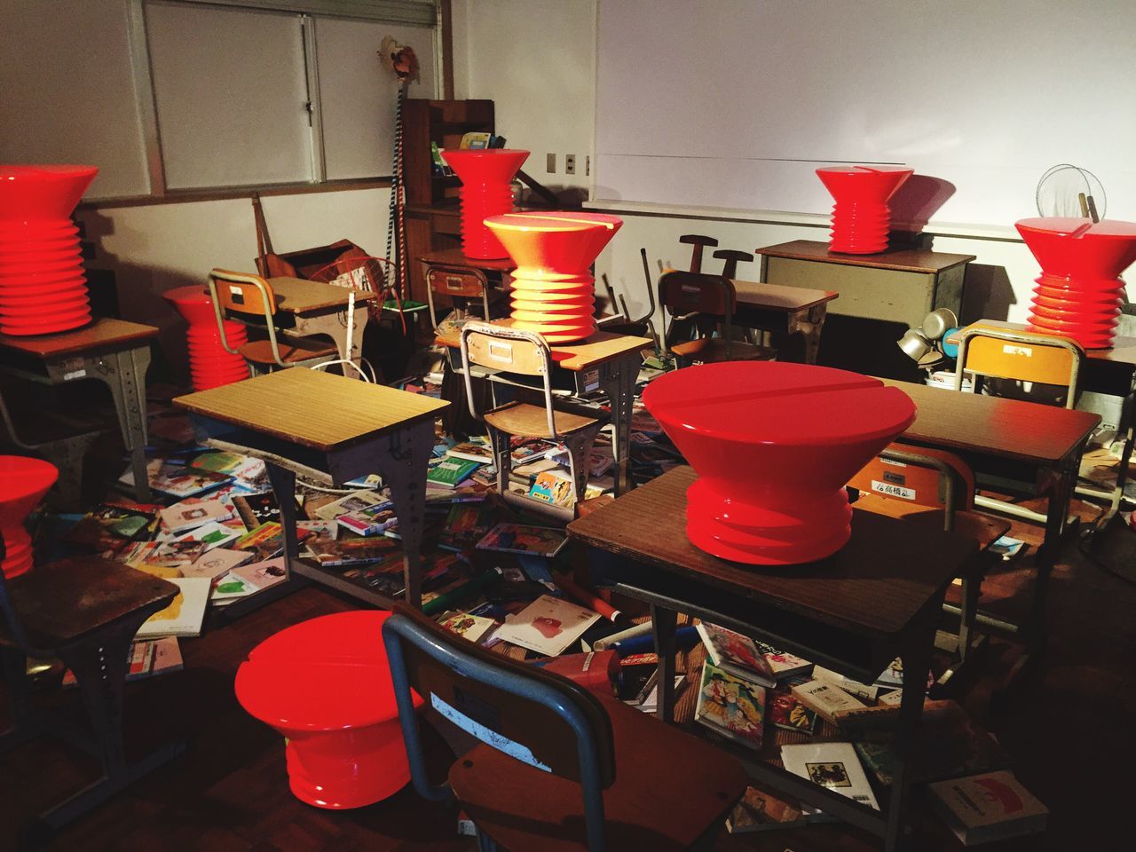 indoors, chair, large group of objects, arrangement, in a row, abundance, absence, table, empty, order, variation, furniture, choice, still life, red, seat, restaurant, group of objects, shelf, place setting