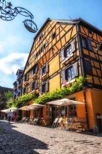 Riquewihr historical town timbered houses along the narrow cobble stoned street. taken in riquewihr