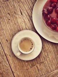 High angle view of coffee served on table