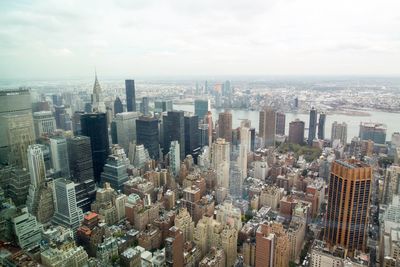 Aerial view of cityscape against sky