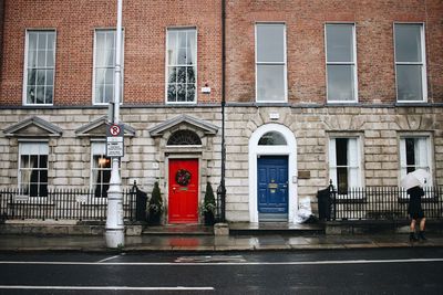 Building by street in city