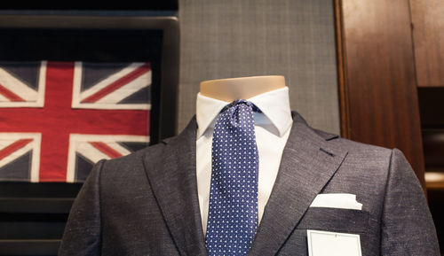 Midsection of businessman standing in office