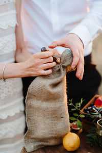 Midsection of woman preparing food