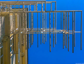 Low angle view of building against clear blue sky
