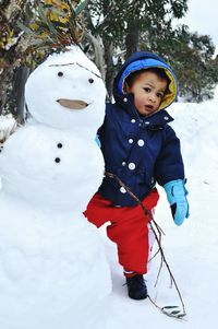 Toddler playing in winter