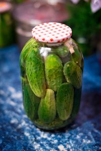 Close-up of fruits in jar on table