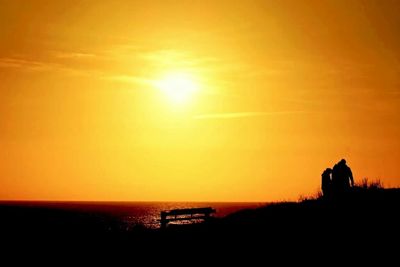 Scenic view of sea at sunset