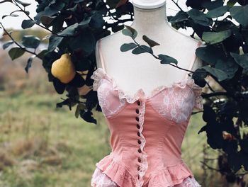 Close-up of woman walking on plant