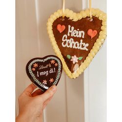 Close-up of hand holding heart shape