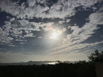 Scenic view of silhouette landscape against sky at sunset