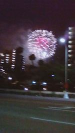 Blurred motion of firework display at night