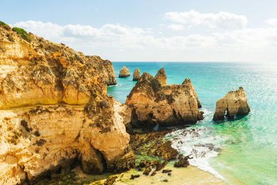 High level view of rugged coastline, alvor, algarve, portugal, europe