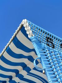 Low angle view of building against blue sky