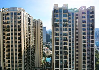 Low angle view of modern buildings against sky