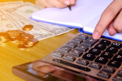 Close-up of human hand on table