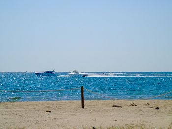 Scenic view of sea against clear sky