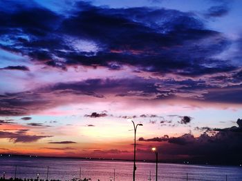 Scenic view of sea against dramatic sky