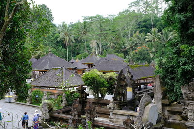 Panoramic view of trees and buildings against sky