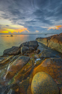 Scenic view of sea against sky during sunset