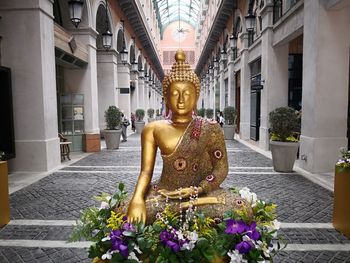 Low angle view of statue against cloudy sky