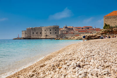 The beautiful banje beach and dubrovnik city