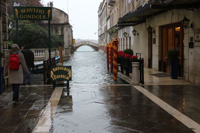 Wet sidewalk in city during rainy season