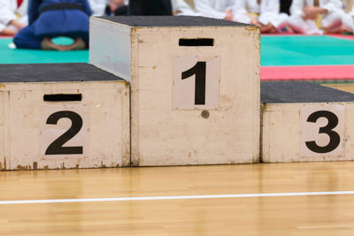 Winners podium on hardwood floor