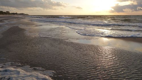 Scenic view of sea against sky during sunset