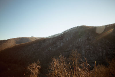 Scenic view of mountains against clear sky