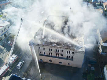 Aerial view of building being extinguished