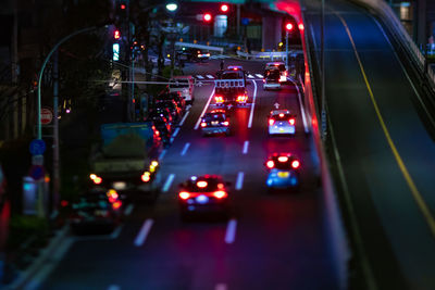 High angle view of illuminated city street at night